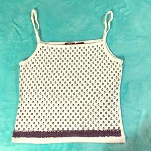 A cotton spaghetti strap tank-top.
